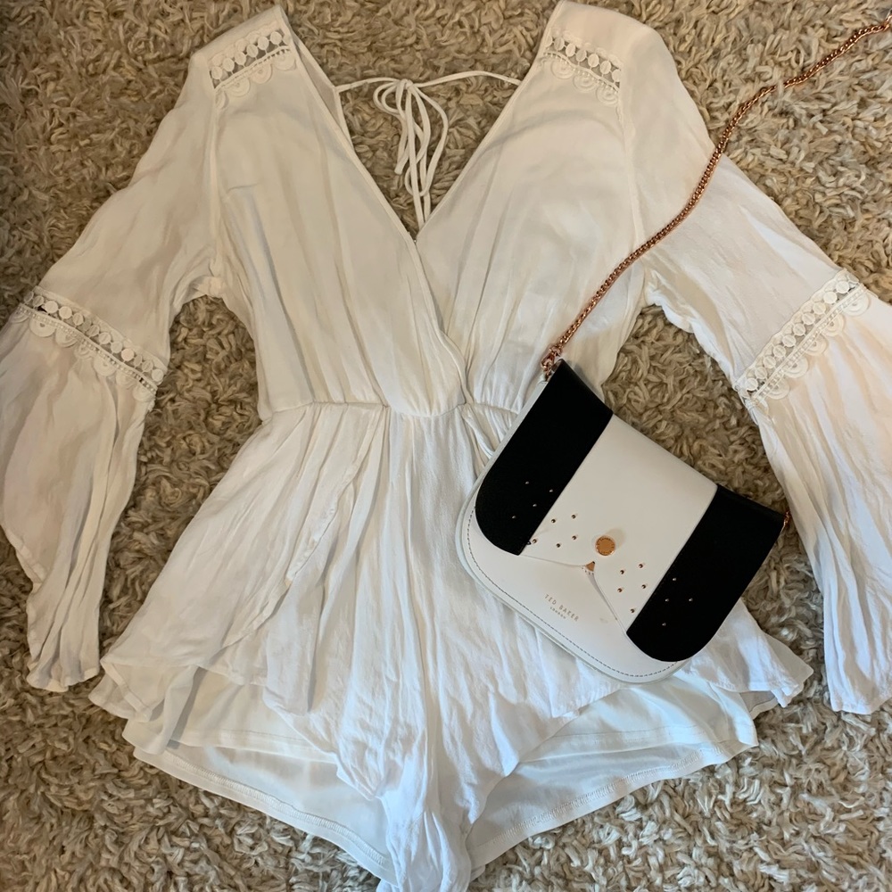 White romper with lace detailing